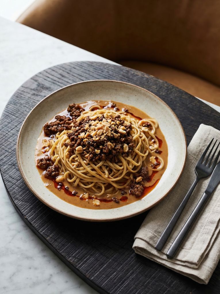 Dan Dan Noodles, plated (AI-generated illustration)